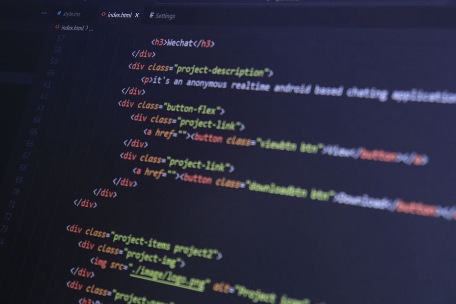 Laptop screen showing decompiled Java code from an Android app