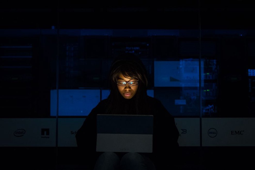 redacted log entries on a terminal screen showing placeholder text