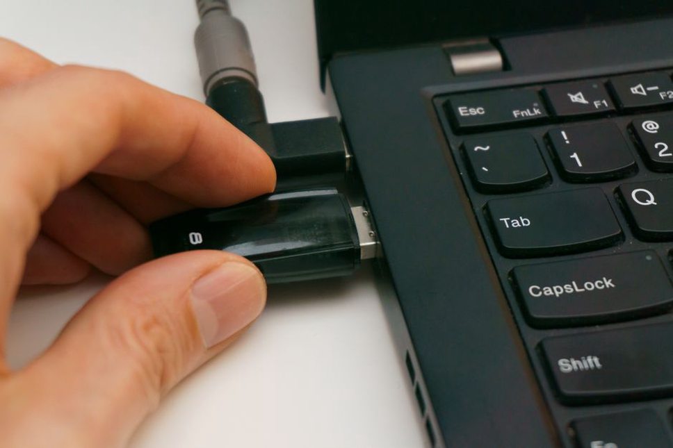 Small USB device inline between keyboard cable and computer port