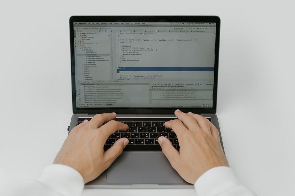 Developer reviewing abandoned project code for leftover credentials and vulnerabilities
