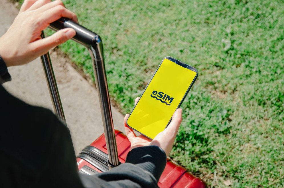 SIM card packaging showing mobile number
