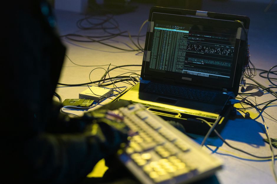 A cybersecurity expert monitoring network data for potential threats
