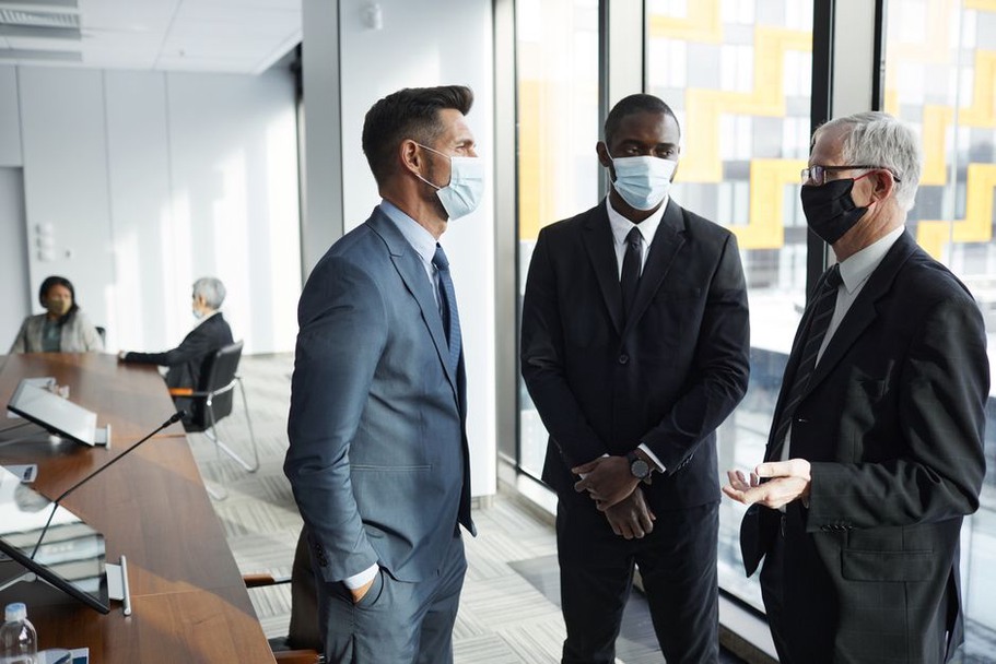 Team discussing improved security protocols post-breach